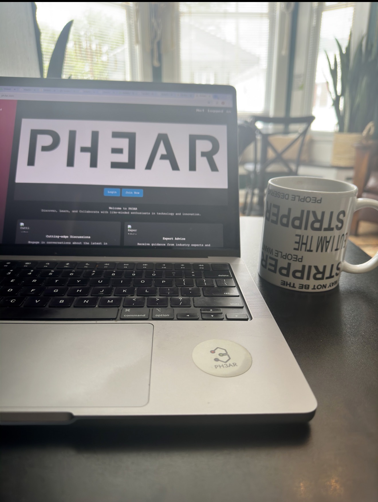 Stripper Mug next to laptop - perfect desk companion